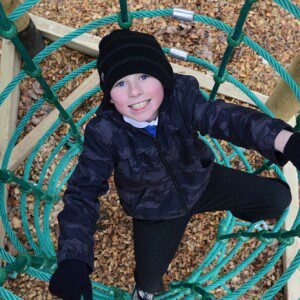 Boy in Rope Tunnel